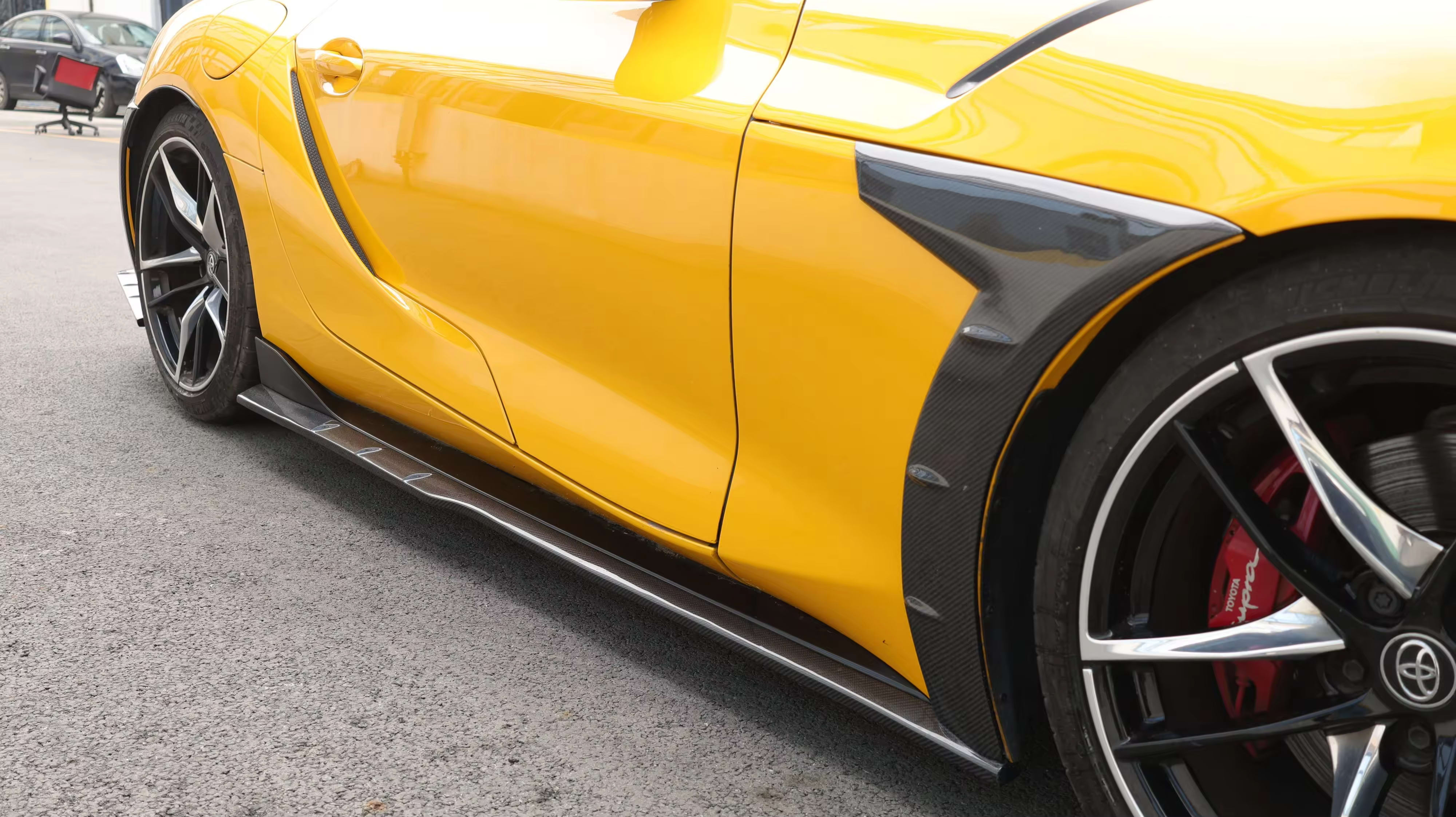 Carbon Fiber TCI Side Skirt extension Set  - Toyota Supra A90