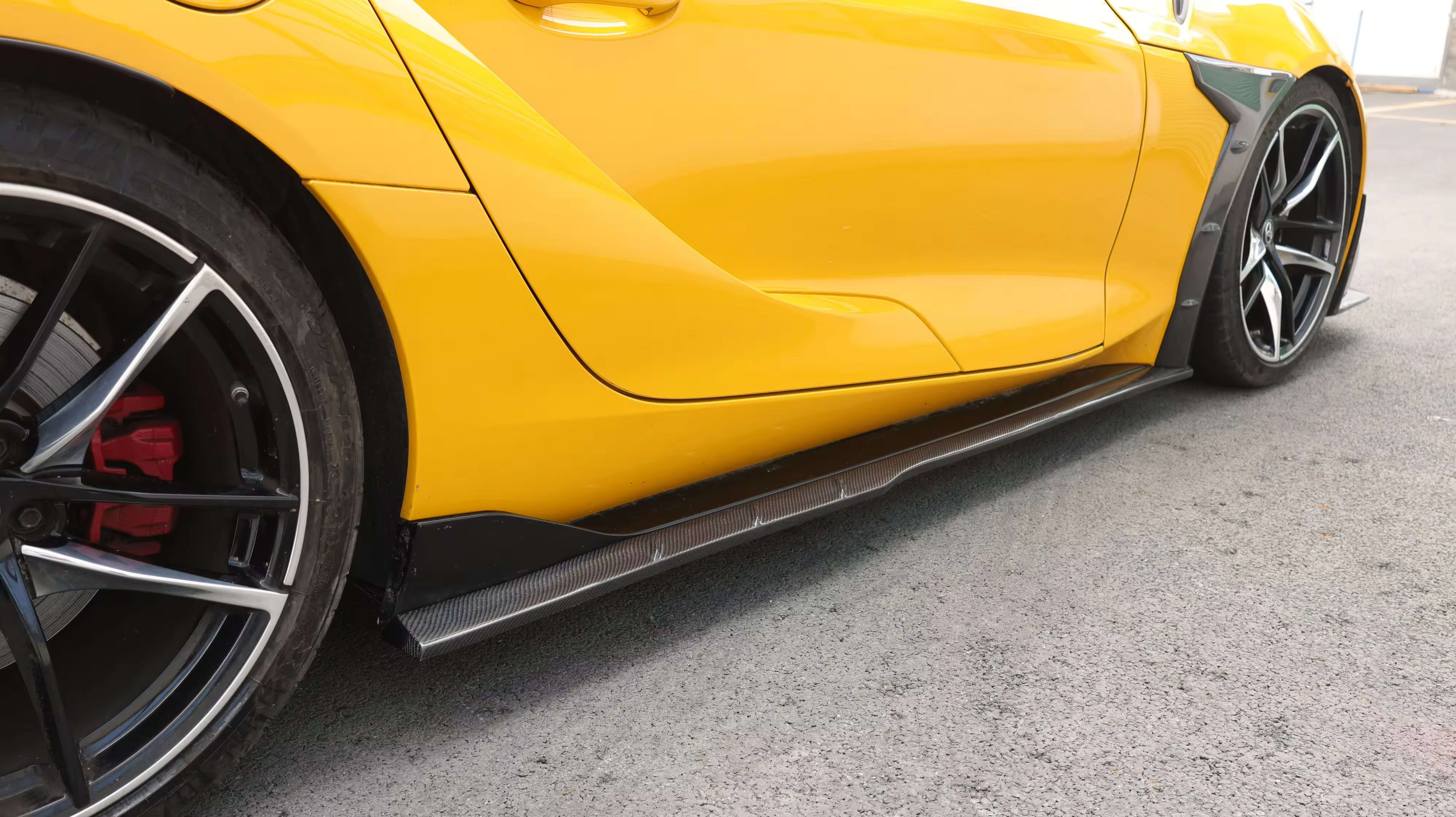Carbon Fiber TCI Side Skirt extension Set  - Toyota Supra A90